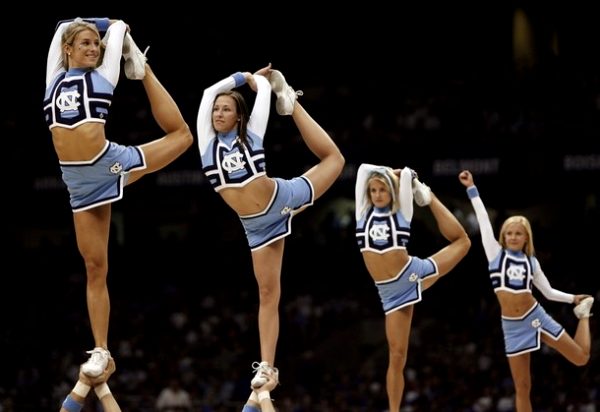 North Carolina Tar Heels cheerleaders perform during the second half of  their NCAA Men's Final Four semi-final basketball game against the Kansas Jayhawks in San Antonio